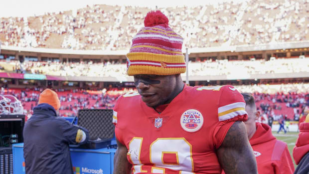 Wide receiver Josh Gordon on the Chiefs sideline in a winter hat.